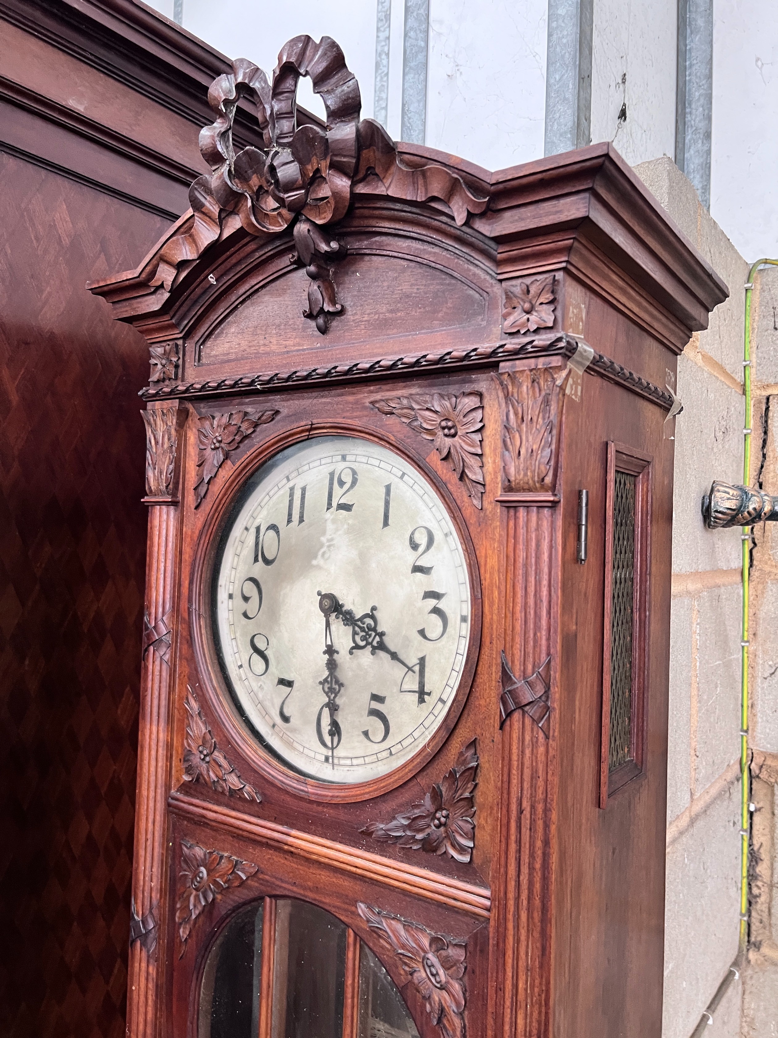 An early 20th century French carved walnut thirty hour longcase clock, height 224cm *Please note the sale commences at 9am.
